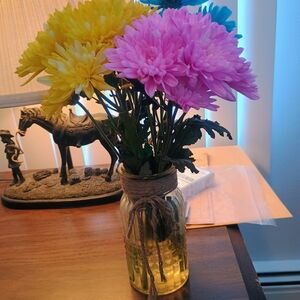 Colorful Floral Arrangement in Glass Jar